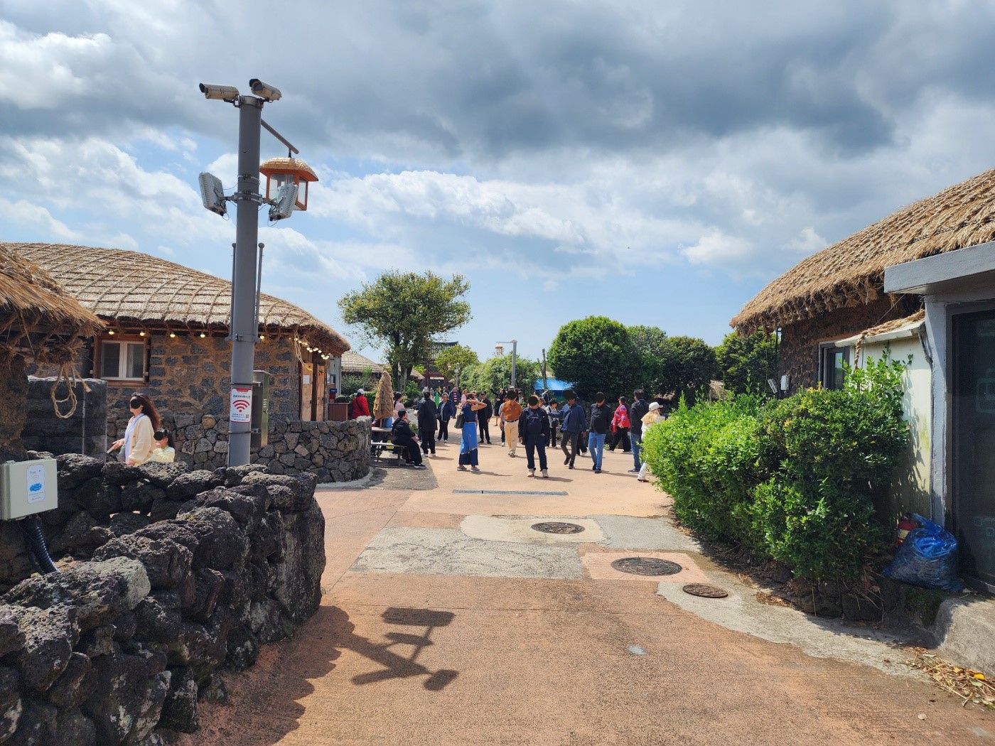 Seongeup Folk Village traditional thatched houses and stone walls in Jeju